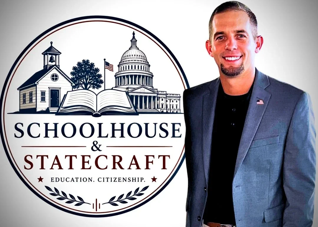 Dylan Reinsel standing beside the Schoolhouse & Statecraft seal.